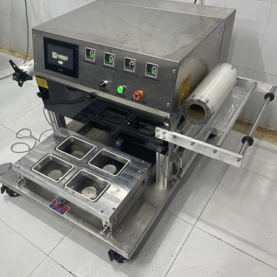 Máy dán khay tự động